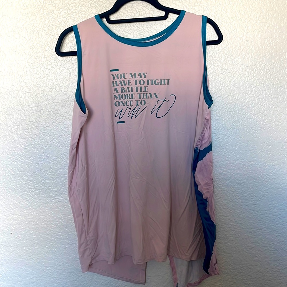Ladyboss workout tank “you may have to fight a battle more than once to win it”